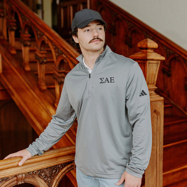 Sigma Alpha EpsilonFraternity Grey Adidas Lightweight Performance 1/4 Zip with Greek letters.