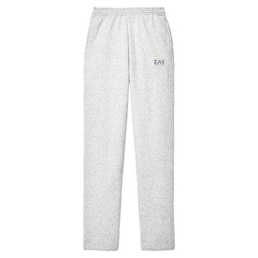 Ash gray classic fleece sweatpants with a relaxed straight-leg fit, elastic waistband, open-bottom cuffs, and subtle printed design on the upper leg.
