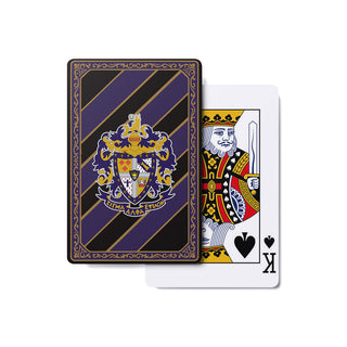 Fraternity man holding a deck of playing cards featuring their coat of arms or crest