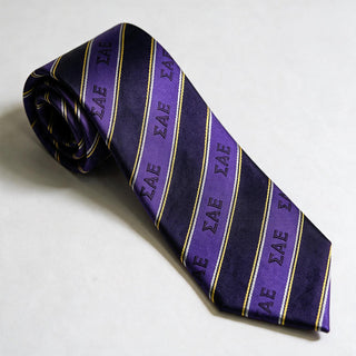 Official Sigma Alpha Epsilon Heritage Striped Silk Tie in purple with woven Sigma Alpha Epsilon Greek letters, premium fraternity neck tie for composite photos, formals, weddings, graduation, and professional attire.