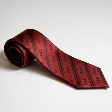 Official Sigma Alpha Epsilon Signature Striped Silk Tie in red with woven Sigma Alpha Epsilon Greek letters, premium fraternity neck tie for composite photos, formals, weddings, graduation, and professional attire.